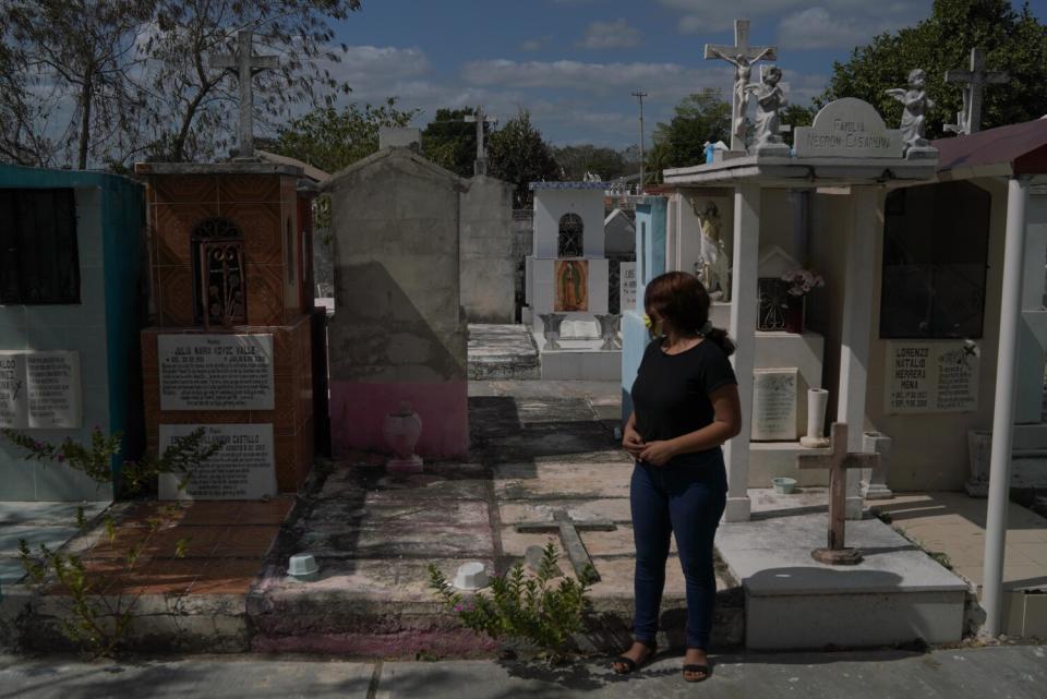 A young woman in a graveyard