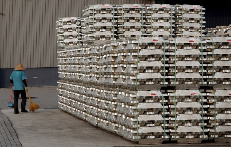 FILE PHOTO: Aluminium ingots are seen outside a warehouse that stores London Metal Exchange stocks in Port Klang Free Zone, outside Kuala Lumpur