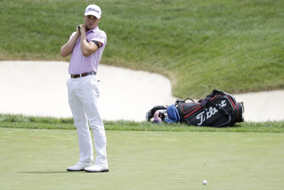 Justin Thomas reacts after missing a putt on the second playoff hole during the final round of the Workday Charity Open golf tournament, Sunday, July 12, 2020, in Dublin, Ohio. (AP Photo/Darron Cummings)