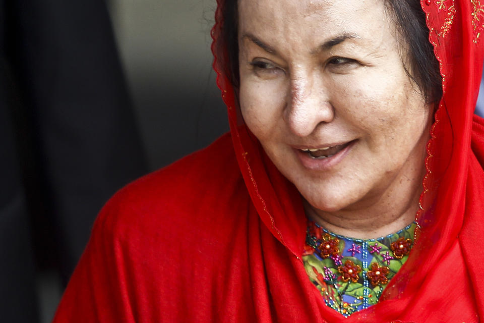 FILE - Rosmah Mansor, wife of former Malaysian Prime Minister Najib Razak, leaves the Malaysian Anti-Corruption Commission (MACC) Office in Putrajaya, Malaysia, on June 5, 2018. Former first lady Rosmah was convicted Thursday, Sept. 1, 2022, of soliciting and receiving bribes during her husband’s corruption-tainted administration Thursday, a week after her husband was imprisoned over the massive looting of the 1MDB state fund. (AP Photo/Sadiq Asyraf, File)