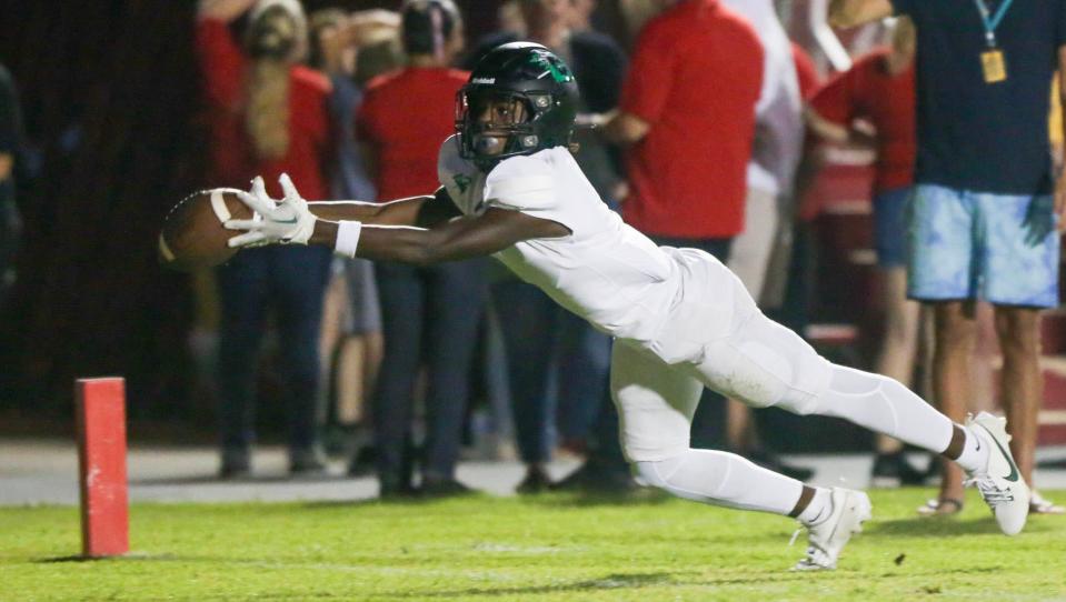 Choctaw WR Isaiah Johnson lays out for a pass at the goal lineduring the Crestview-Choctaw football game at Crestview. The ball just slipped through his fingertips.