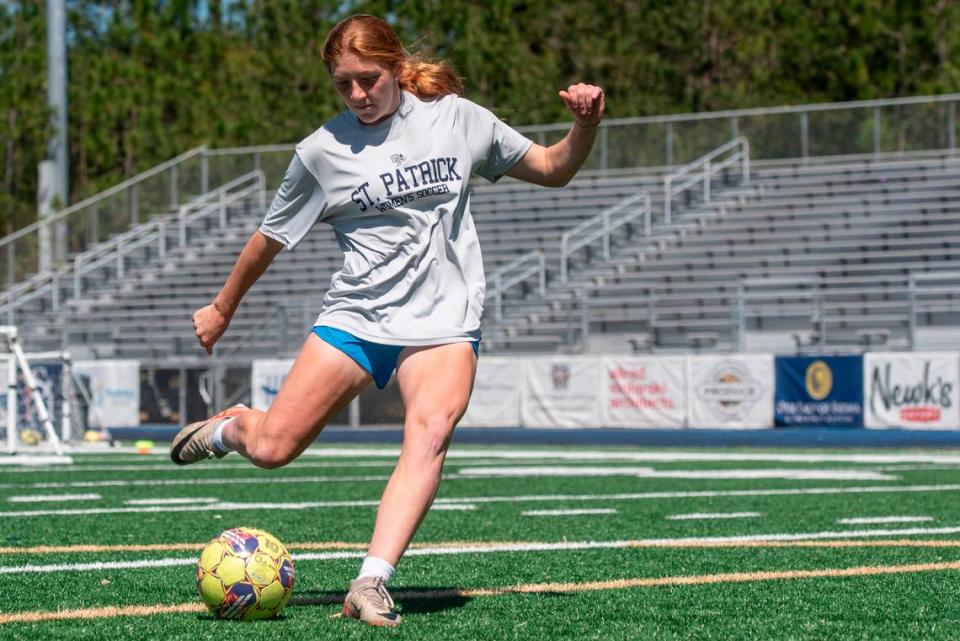 St. Patrick’s Anna Katherine Thriffiley, a junior who plays attacking mid, shoots on goal during practice at St. Patrick Catholic High School on Thursday, March 28, 2024.