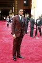 Former NFL football player and TV personality Michael Strahan arrives on the red carpet the 86th Academy Awards in Hollywood, California March 2, 2014. REUTERS/Mike Blake (UNITED STATES TAGS: ENTERTAINMENT) (OSCARS-ARRIVALS)