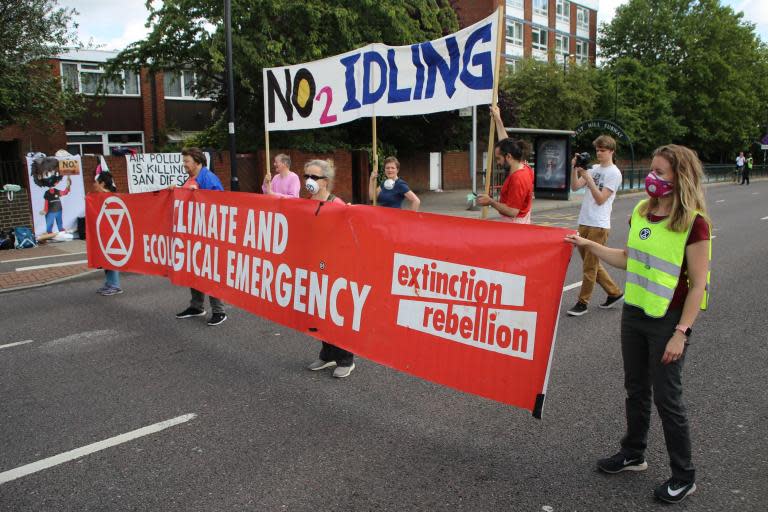 Three lanes on the A3 West Hill in Wandsworth are being closed off by Extinction Rebellion protestors this morning, to highlight the contribution stop-start idling makes to air pollution.The roads blocked make up a small section of the A3 which experience heavy traffic during rush hour. Cars brake up to 40 times, and idle for 10 minutes, just to get down one mile of road, which is a violation of EU pollution limits, protestors say.They argue this can be resolved through the introduction of 'gating' – a traffic management system which requires drivers to stop, turn off their engines for a few minutes, then move forward in groups once the road ahead is clear.Activists will trial this method during today's protest.David Smith, local resident and air pollution campaigner at Little Ninja, explains: “Air pollution is particularly high on major arterial roads that become narrow residential streets, like the three lanes of A3 traffic bottlenecking into a single lane to go down West Hill.” He continues, “Every acceleration of a stationary vehicle can cause ten times the emissions of continuous driving. Every time vehicles brake, particulate matter is released from brake, tyre and road surface wear. An idling vehicle produces almost twice the emissions of a moving vehicle. “Drivers and passengers in particular suffer from this issue as air pollution can be nine to twelve times higher inside the vehicle.” This is Extinction Rebellion Wandsworth's first protest, and they have coordinated with local schools and emergency services ahead of today's action.