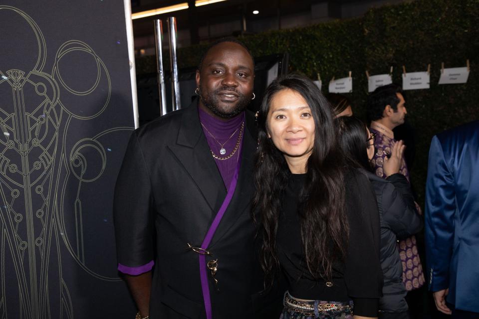Brian Tyree Henry is seen with "Eternals" director Chloé Zhao at the film's premiere on October 18, 2021.