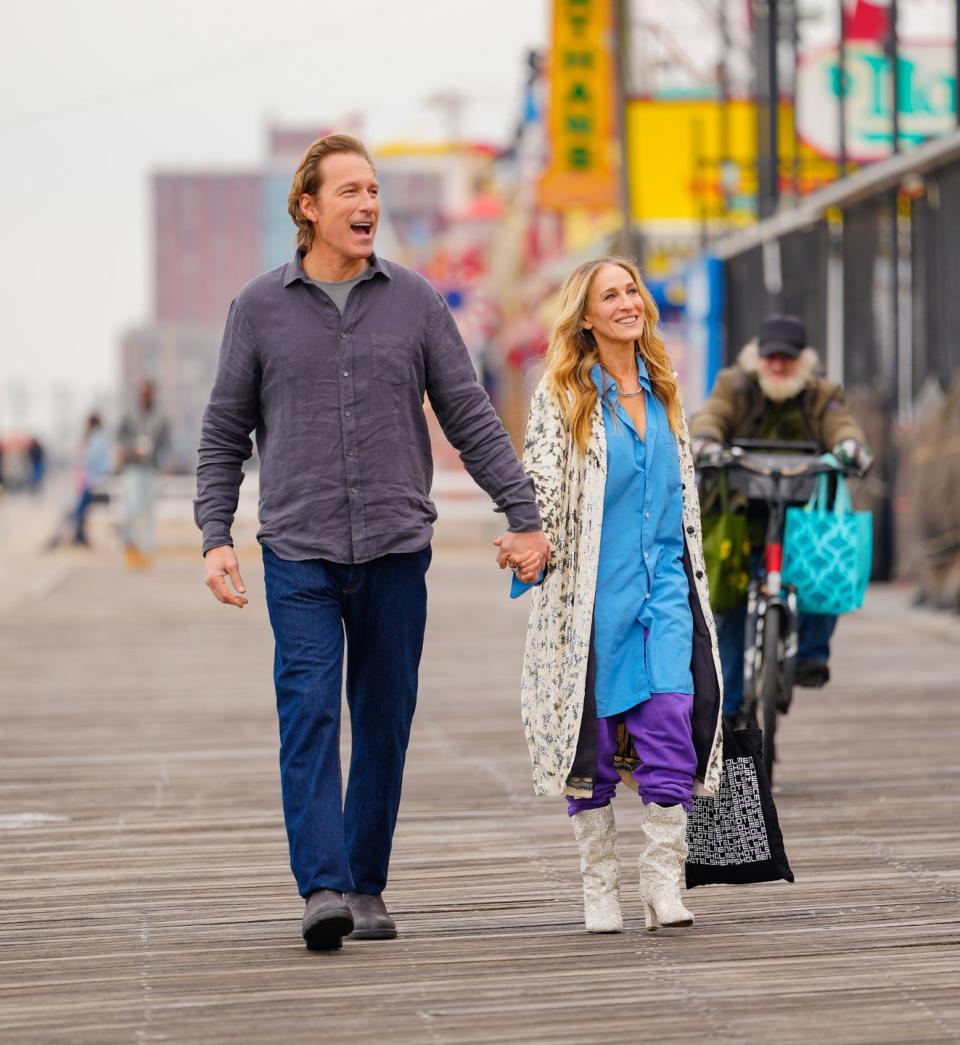 new york, new york february 21 john corbett and sarah jessica parker film a scene for and just like that on the coney island boardwalk on february 21, 2023 in new york city photo by gothamgc images