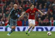 <p>Manchester United’s Daley Blind in action with Celta Vigo’s John Guidetti </p>