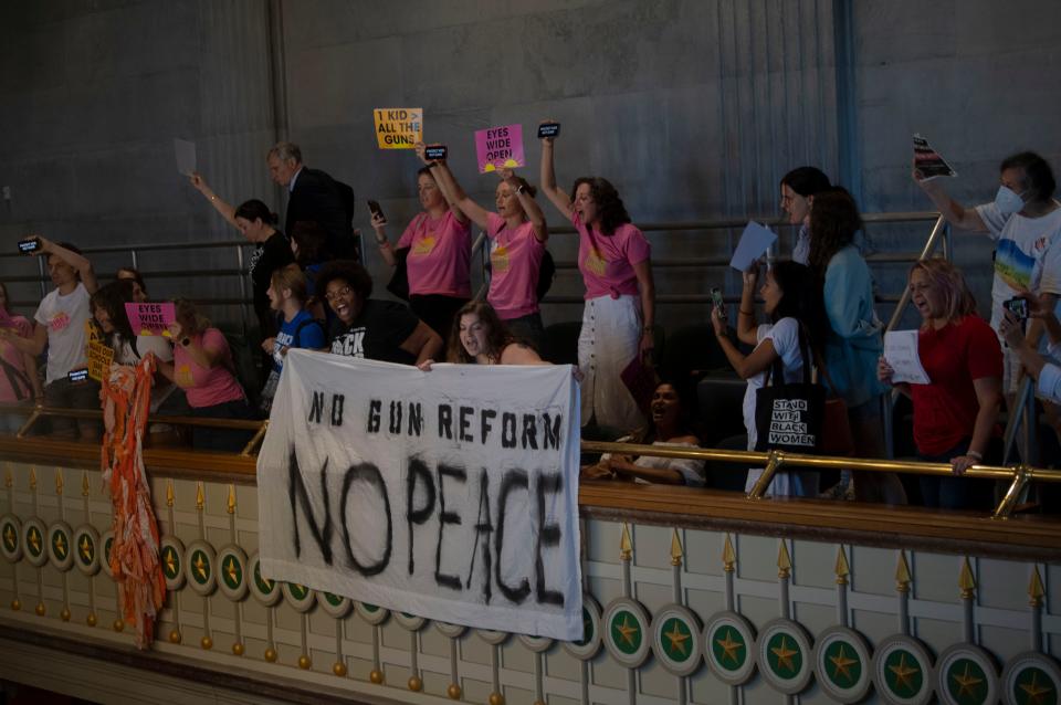 Gallery spectators drop a banner saying “No Gun Reform no Peace’ at the end of the Senate session at State Capitol Building in Nashville , Tenn., Wednesday, Aug. 23, 2023.