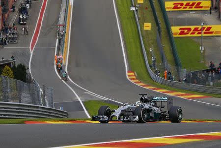 Mercedes Formula One driver Lewis Hamilton of Britain drives during a practice session at the Belgian F1 Grand Prix in Spa-Francorchamps August 22, 2014. REUTERS/Yves Herman