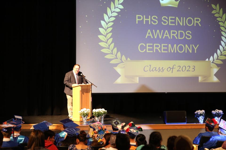 Dan Marburger welcomes attendees to the Senior Awards Assembly on Wednesday, May 17, 2023, at Perry Performing Arts Center.