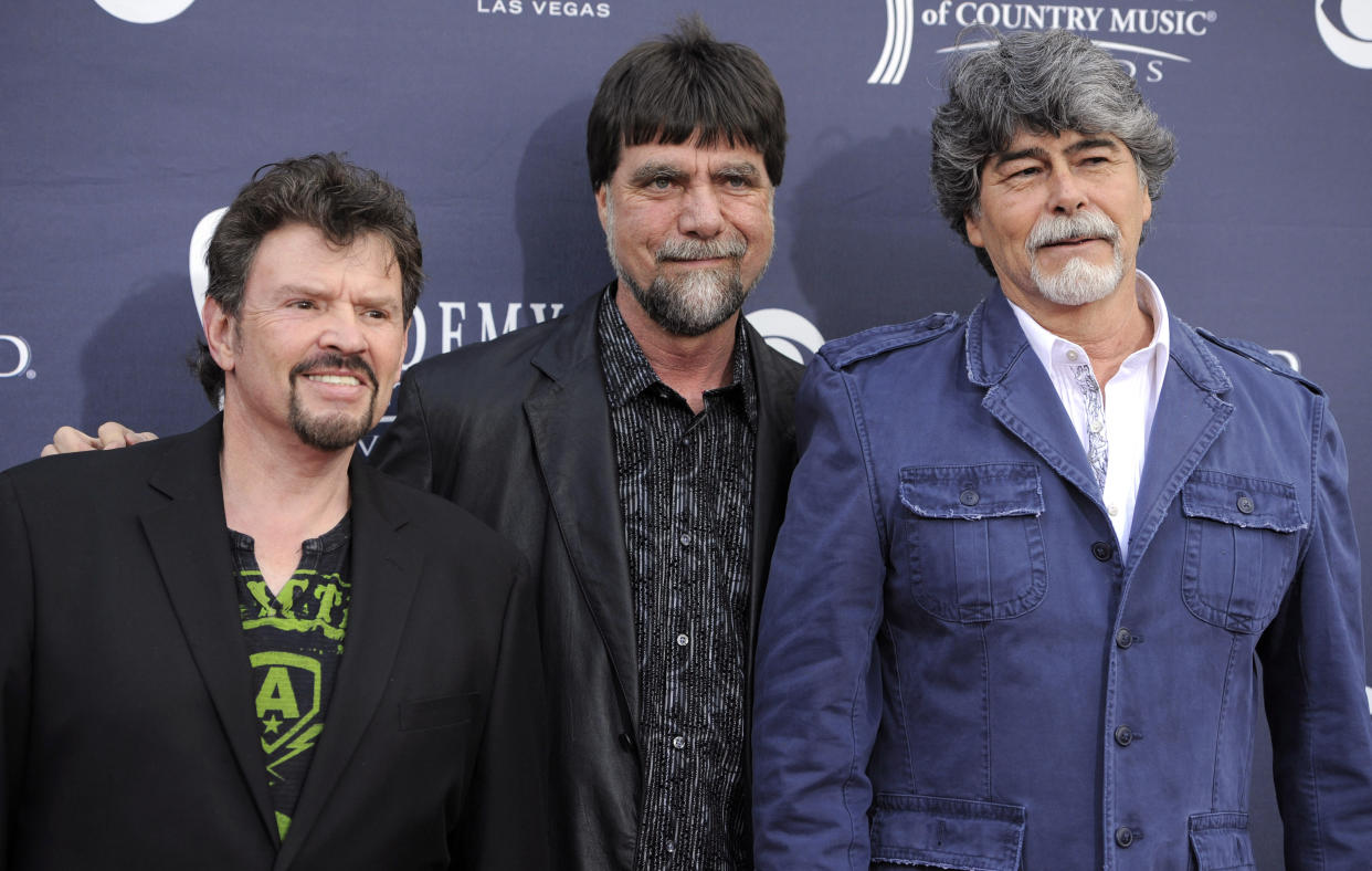 FILE - Jeff Cook, from left, Teddy Gentry and Randy Owen, of the band Alabama, appear at the 46th Annual Academy of Country Music Awards in Las Vegas. Cook died Nov. 7, 2022 at his home in Destin, Fla. He was 73. (AP Photo/Chris Pizzello, File)