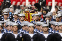 <p>The coffin of Britain's Queen Elizabeth makes its way to Westminster Abbey on the day of the state funeral and burial of Britain's Queen Elizabeth, in London, Britain, September 19, 2022 REUTERS/John Sibley</p> 