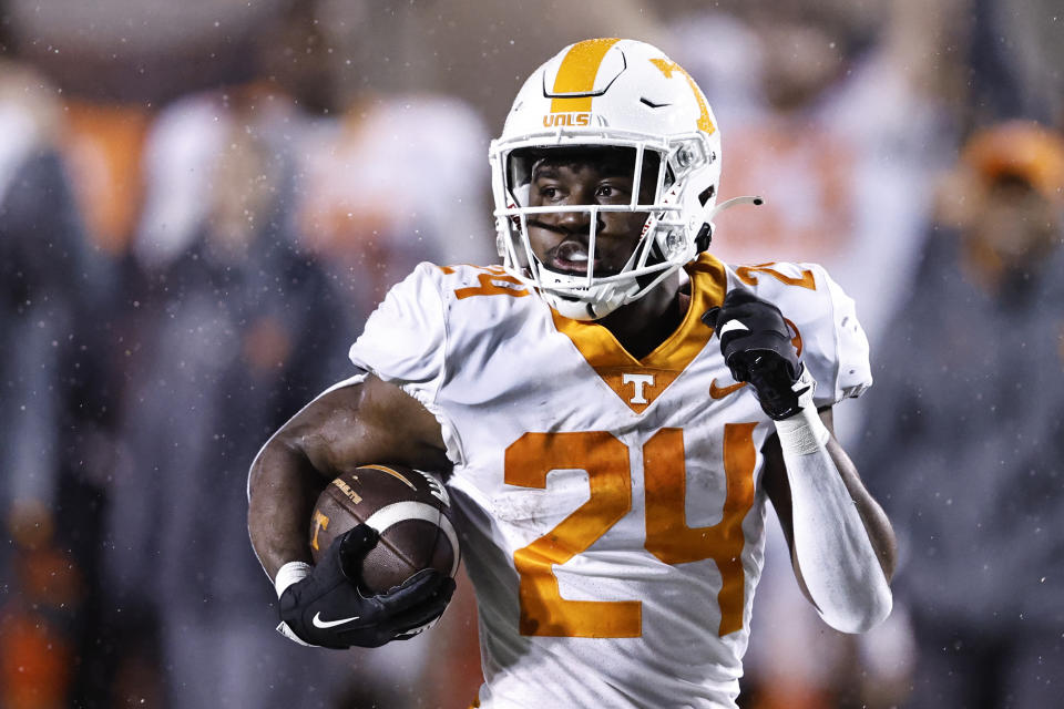 Tennessee running back Dylan Sampson (24) heads for a touchdown during the second half of the team's NCAA college football game against Vanderbilt, Saturday, Nov. 26, 2022, in Nashville, Tenn. (AP Photo/Wade Payne)