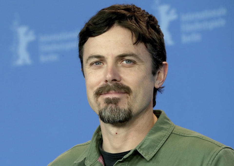 FILE - In this Feb. 8, 2019 file photo, Actor Casey Affleck poses for the photographers during a photo call for the film 'Light of My Life' at the 2019 Berlinale Film Festival in Berlin, Germany. Affleck is back in the director’s chair with the slow-burn apocalyptic thriller “Light of My Life.” Knowingly inspired by films like “Children of Men,” “Light of My Life” is about a father and his pre-teen daughter trying to survive in a world where women have mostly been wiped out by disease. Canadian breakout Anna Pniowsky plays his daughter. (AP Photo/Michael Sohn)