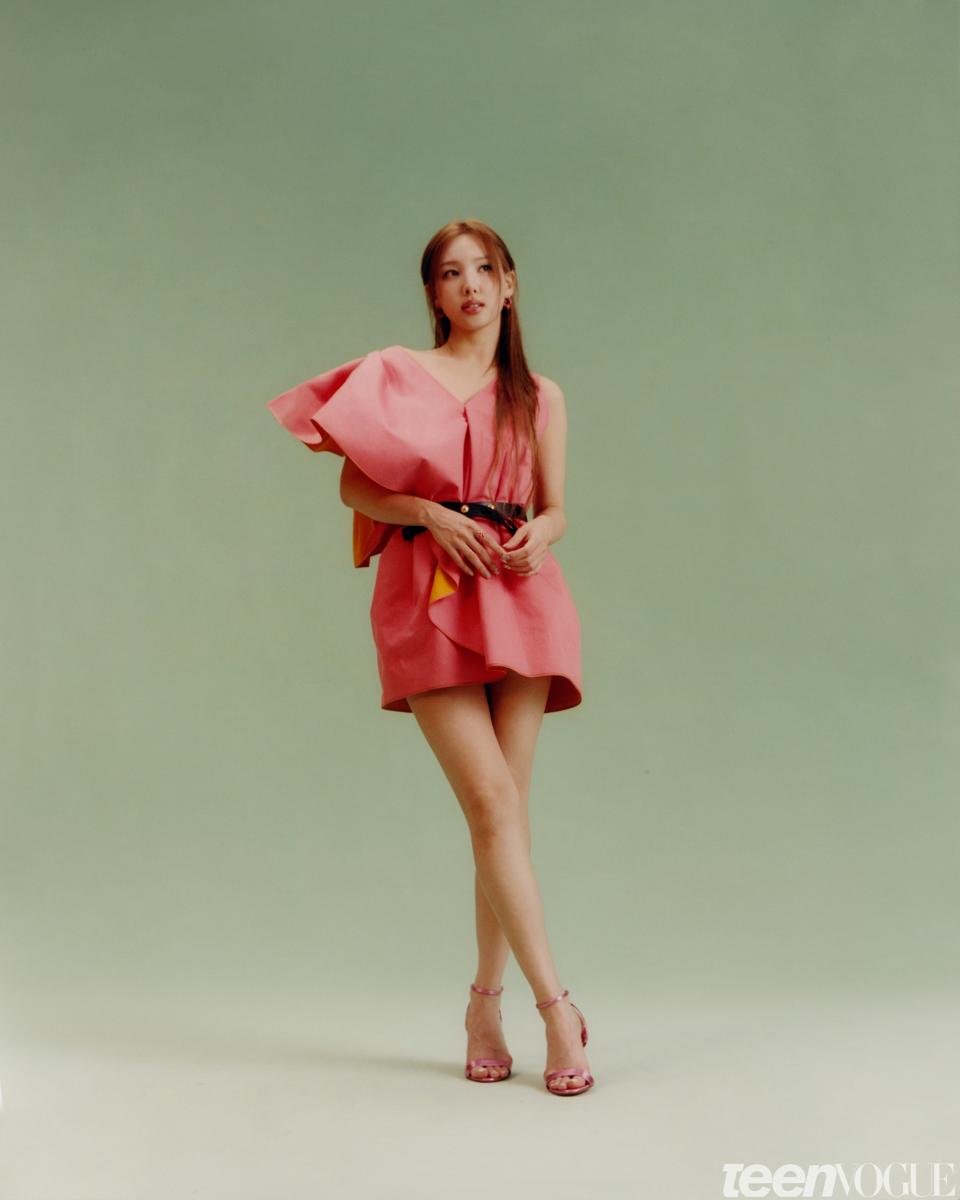 Nayeon wears a [Louis Vuitton dress and belt](https://us.louisvuitton.com/), [Christian Louboutin shoes](https://us.christianlouboutin.com/us_en/), and [Bea Bongiasca jewelry](https://beabongiasca.com/).