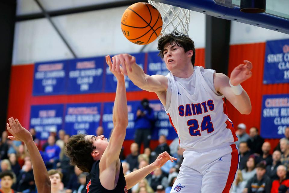 Oklahoma Christian School's Carson Jones blocks the shot of North Rock Creek's David King uring a boys high school basketball game between North Rock Creek and Oklahoma Christian School in Edmond, Okla., Tuesday, Jan. 9, 2024.