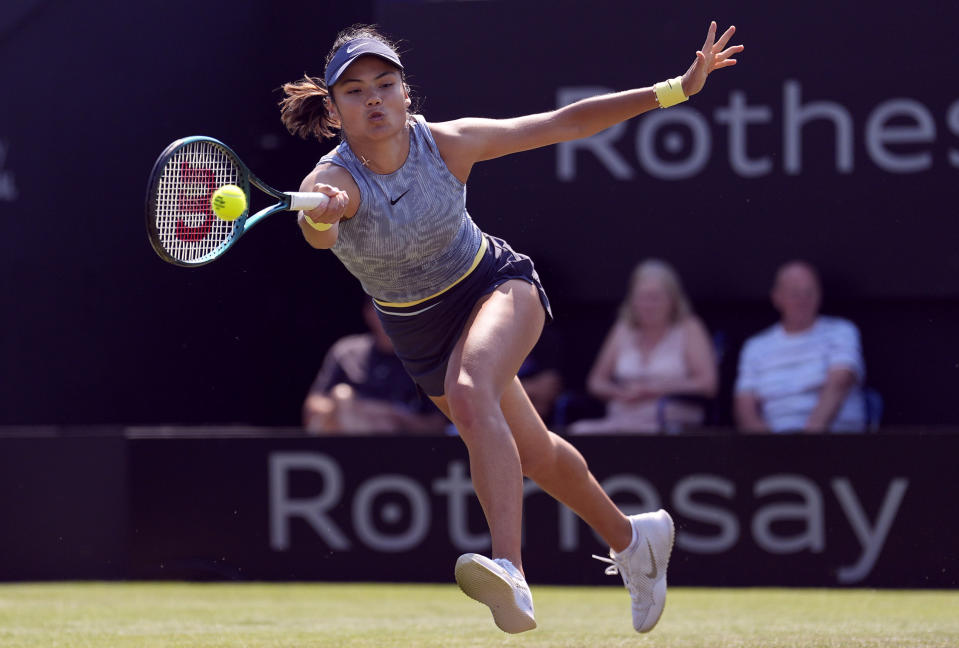 Britain's Emma Raducanu hits a forehand to United States' Jessica Pegula during their women's singles match at the Rothesay International tennis tournament at Devonshire Park, Eastbourne, England, Wednesday June 26, 2024. (Andrew Matthews/PA via AP)