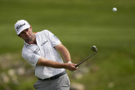 Cameron Young chips to the green on the 16th hole during a practice around for the PGA Championship golf tournament at Oak Hill Country Club on Tuesday, May 16, 2023, in Rochester, N.Y. (AP Photo/Eric Gay)