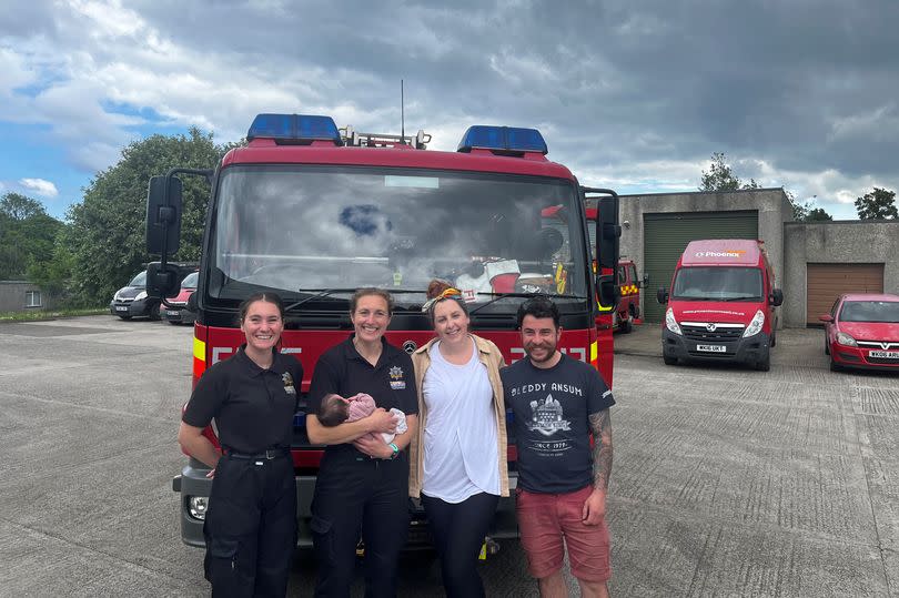 Firefighters Rosie Tonkin, Katie Hoskins with Olive and her parents Alice Hearle and Josh Beardmore