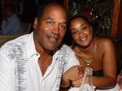 <p>Alexander Tamargo/Getty</p> O.J. Simpson and daughter Arnelle Simpson at the Forge restaurant during DJ Irie's birthday celebration on June 20, 2007 in Miami Beach, Florida.