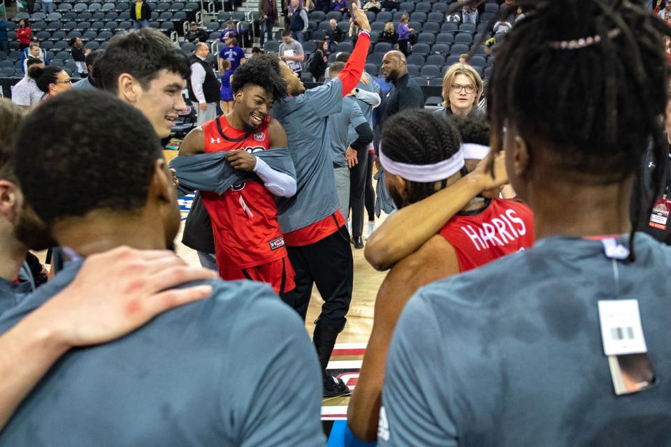 The Southeast Missouri State University Redhawks wear their championship shirts following their victory over the Tennessee Tech Golden Eagles in the OVC men's basketball championship at Ford Center on Saturday, March 4, 2023.