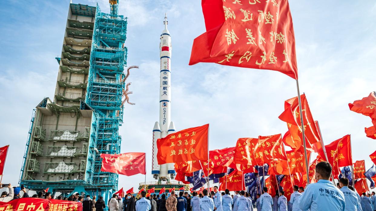  China's Shenzhou-15 manned spacecraft and a Long March-2F rocket being transferred to the launching area at Jiuquan Satellite Launch Center on November 21, 2022 in Jiuquan, Gansu Province of China.  