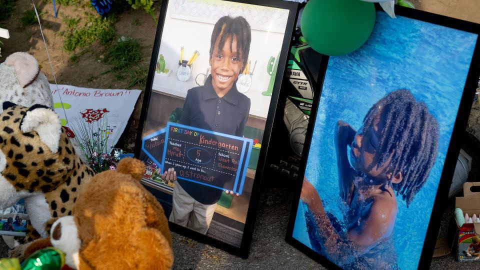 Photos of Sir'Antonio and stuffed animals help form a memorial to him on May 10, a week after he was killed. - Nick Wagner/The Kansas City Star/TNS/Zuma