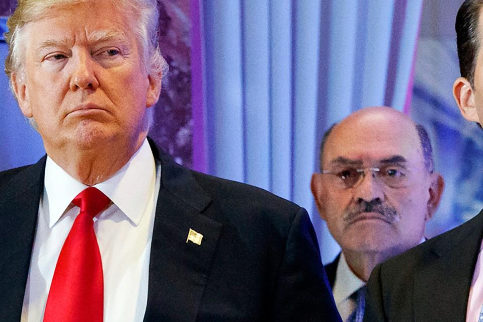 Allen Weisselberg stands next to Donald Trump in 2017 (AP)