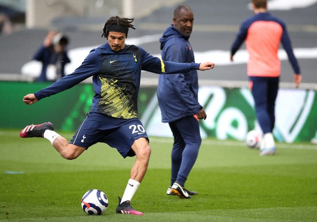 Dele Alli warms up ahead of the match