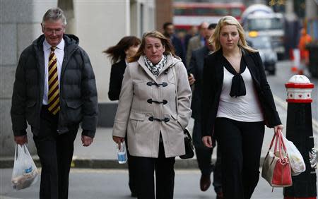 Family members of British soldier Drummer Lee Rigby leave during a lunch break in the trial of his suspected murderers at the Old Bailey in central London December 3, 2013. REUTERS/Andrew Winning