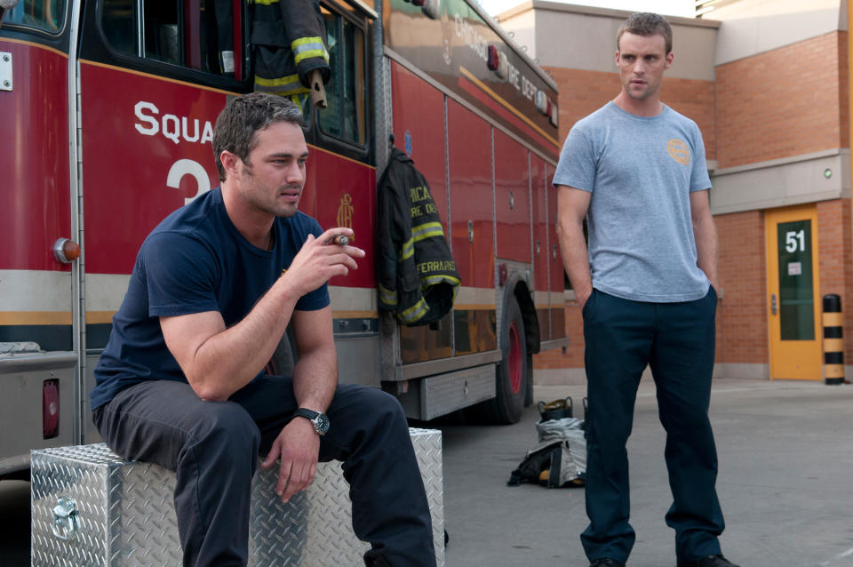 Taylor Kinney and Jesse Spencer in the pilot episode of “Chicago Fire” - Credit: Everett Collection