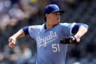 Kansas City Royals starting pitcher Brady Singer throws during the first inning of a baseball game against the Milwaukee Brewers Wednesday, May 8, 2024, in Kansas City, Mo. (AP Photo/Charlie Riedel)