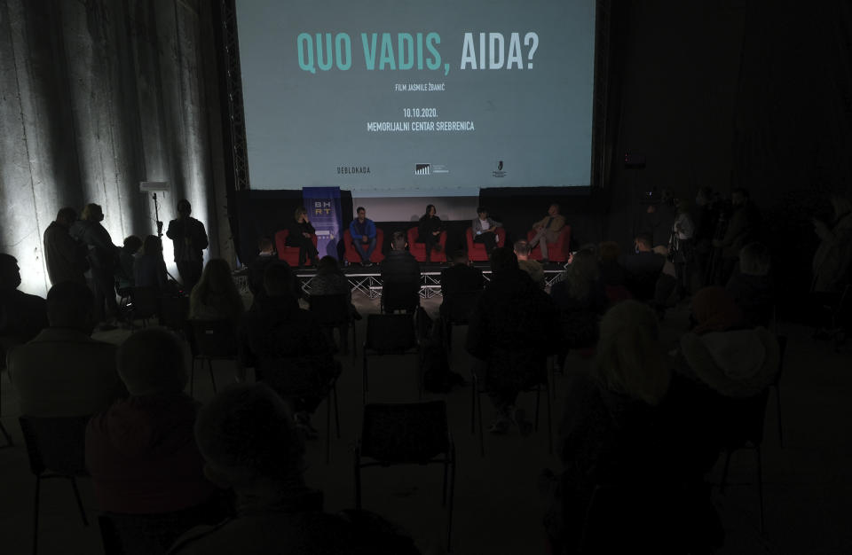 Massacre survivors and young people from across ethnically and politically divided country attend the first public showing of Bosnian filmmaker Jasmila Zbanic's film on the 1995 massacre in Srebrenica - "Quo Vadis, Aida?", in the eastern Bosnian town of Srebrenica, Saturday, Oct. 10, 2020. The Srebrenica massacre was the culmination of Bosnia's 1992-95 war, which pitted the country's three main ethnic factions - Serbs, Croats and Bosnian Muslims. (AP Photo/Kemal Softic)
