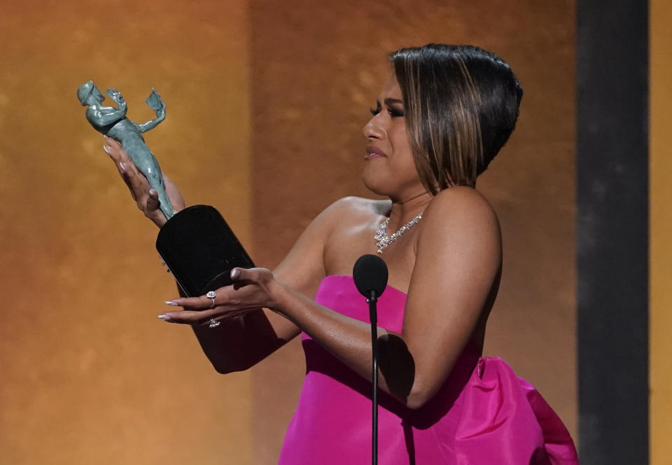 Ariana DeBose accepts the award for outstanding performance by a female actor in a supporting role for "West Side Story" at the 28th annual Screen Actors Guild Awards at the Barker Hangar on Sunday, Feb. 27, 2022, in Santa Monica, Calif. (AP Photo/Chris Pizzello)