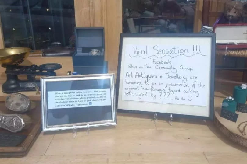 Sally shared the 'amusing' note in her shop window