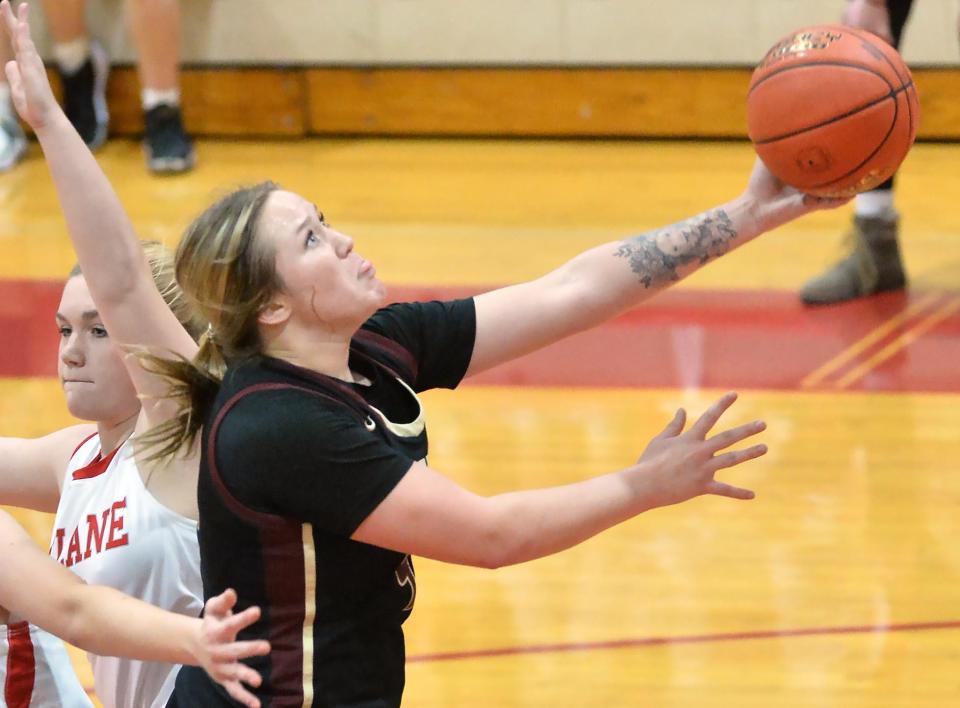 North East's Alex Cozzens sank this shot after splitting two General McLane defenders in Washington Township on Dec. 7.