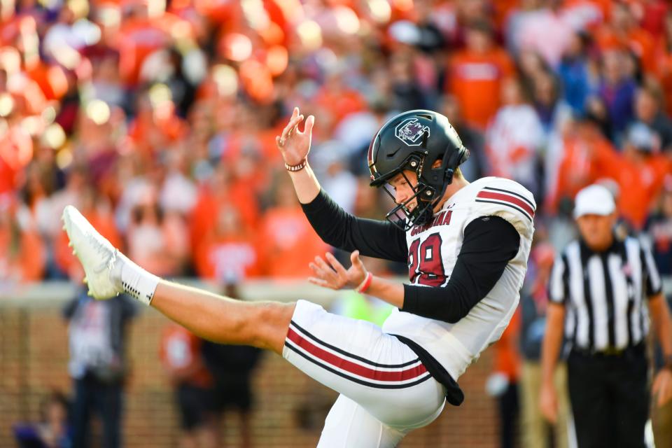 South Carolina punter Kai Kroeger (39) punts the ball during a game that resulted in a 31-30 win for the Gamecocks at Memorial Stadium in Clemson, South Carolina Saturday, Nov. 26, 2022.   