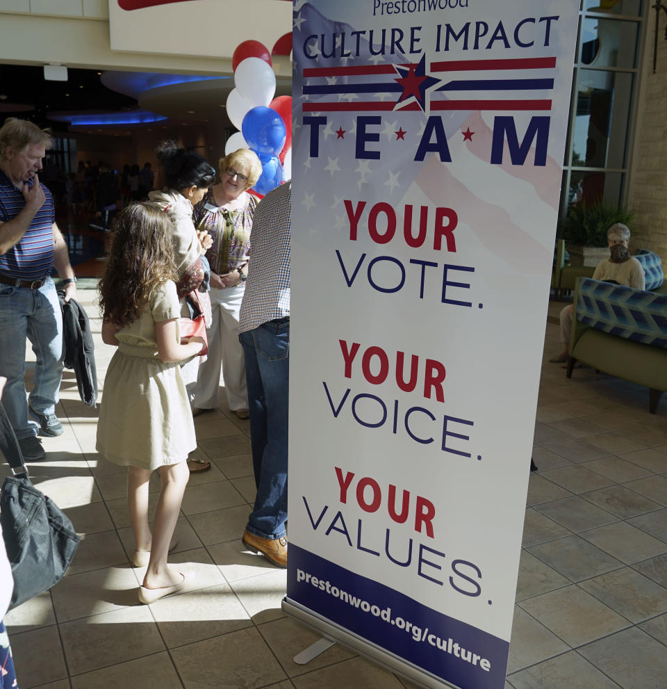 The Prestonwood Cultural Impact Team is set up at Prestonwood Baptist Church Sunday, Oct. 11, 2020, in Plano, Texas. Three weeks before the U.S. presidential election, an evangelical church in a Dallas suburb has emerged as a front for Republicans fighting to keep the diversifying state from flipping to Democratic presidential candidate Joe Biden. (AP Photo/LM Otero)