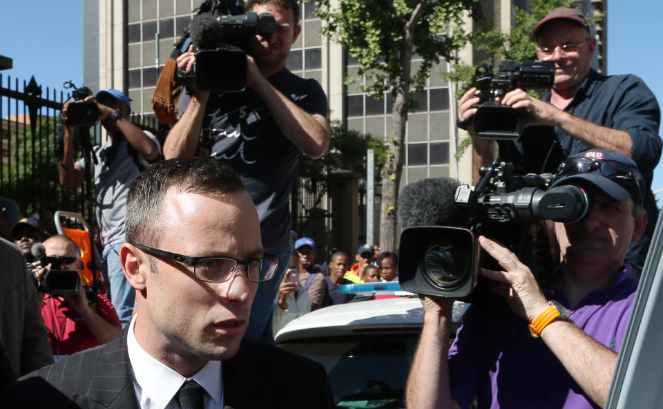 File: In this Tuesday, March 25, 2014 file photo, Oscar Pistorius leaves the high court in Pretoria, South Africa. The murder trial of Pistorius is expected to enter a critical phase of testimony Monday as the defense attempts to overcome a faltering start and show how the disabled Olympic athlete fatally shot girlfriend Reeva Steenkamp by mistake because he was overwhelmed by a long-held fear of violent crime. (AP Photo/Themba Hadebe-File)