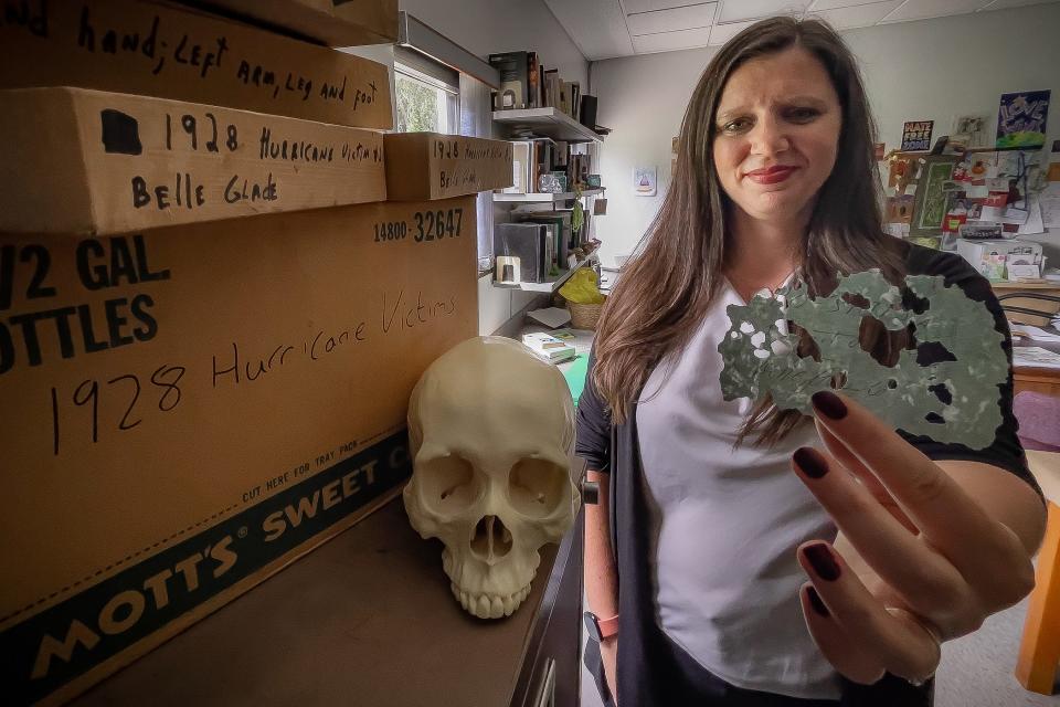 Florida Atlantic University associate professor Meredith Ellis has spent years investigating the mystery within the cardboard boxes of remains marked "1928 Hurricane Victims" ever since she discovered the boxes and a piece of paper as she was organizing department artifacts.