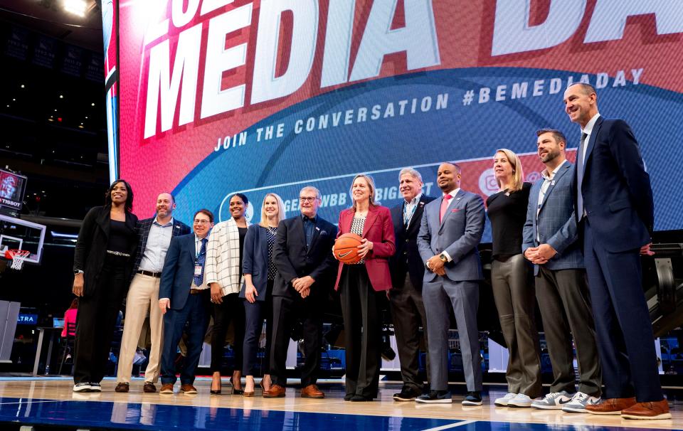 Big East commissioner Val Ackerman poses with women's teams coaches, including Erin Batth, left, during the Big East Media Day at Madison Square Garden in New York on Tuesday,