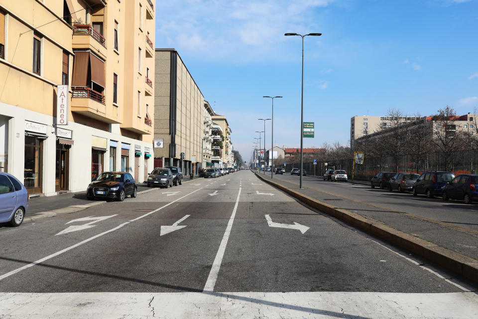 A main road in the Bicocca neighbourhood is devoid of any traffic.