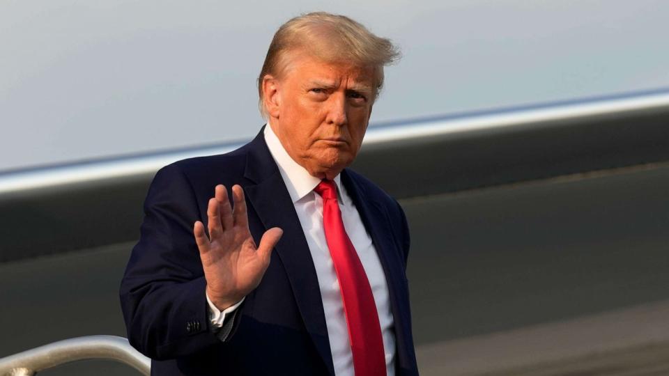 PHOTO: Former President Donald Trump steps off his plane as he arrives at Hartsfield-Jackson Atlanta International Airport, Aug. 24, 2023, in Atlanta. (Alex Brandon/AP)