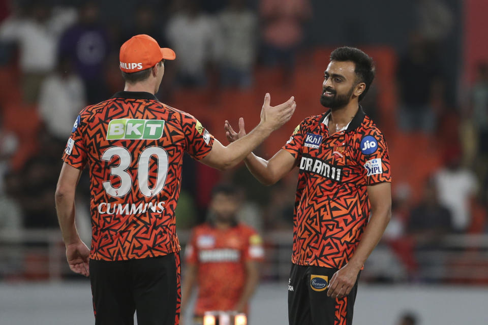 Sunrisers Hyderabad's captain Pat Cummins, left, and Sunrisers Hyderabad's Jaydev Unadkat players celebrate their win during the Indian Premier League cricket match between Sunrisers Hyderabad's and Punjab Kings in Mohali, India, Tuesday, April . 9, 2024.(AP Photo/Surjeet Yadav)