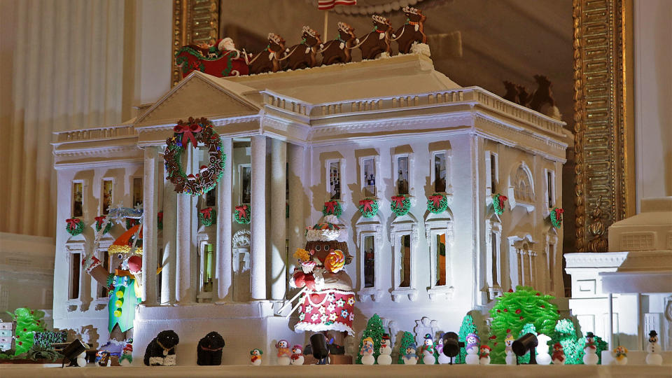 The White House Gingerbread House sits in the State Dining Room.