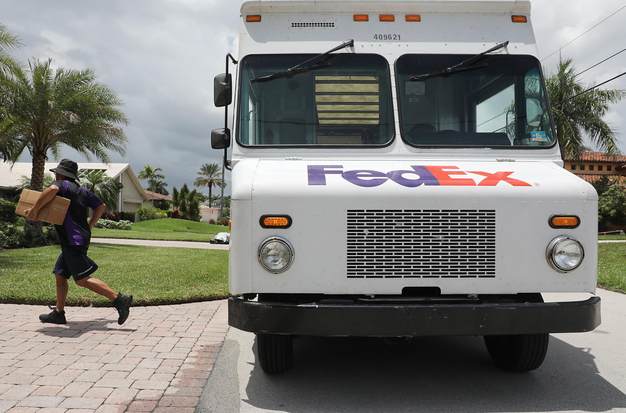 A FedEx delivery truck is seen on August 07, 2019 in Fort Lauderdale, Florida, the day that FedEx announced that it would stop delivering ground shipments for the Amazon company. (Photo by Joe Raedle/Getty Images)