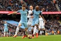 <p>Swansea City’s Gylfi Sigurdsson is tackled by Manchester City’s John Stones (left) and Manchester City’s Fernandinho (right) during the Premier League match between Manchester City and Swansea City at the Etihad Stadium on February 5, Manchester, England. </p>