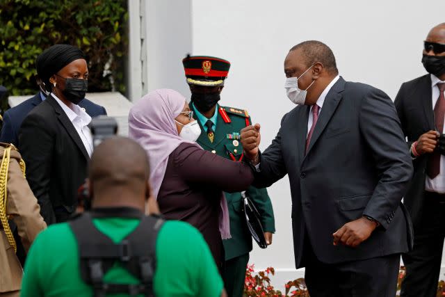 Hassan is greeted by Kenya's president Uhuru Kenyatta in Nairobi on May 4. 