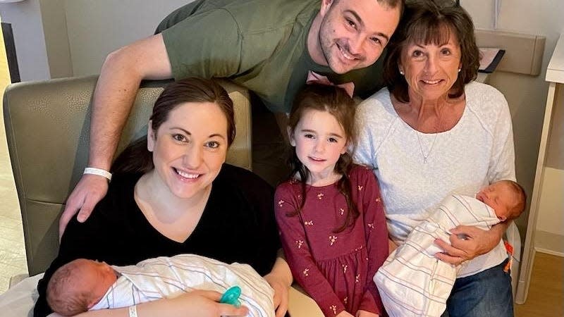 May 2023 photo of Ariana Sutton (in black shirt), with husband Tyler Sutton, daughter Melody Ki, newborn twins Everly Irene and Rowan Stephen Sutton and mother-in-law Christine S. Sutton.