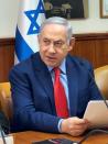 FILE PHOTO: Israeli Prime Minister Benjamin Netanyahu looks on during the weekly cabinet meeting in Jerusalem